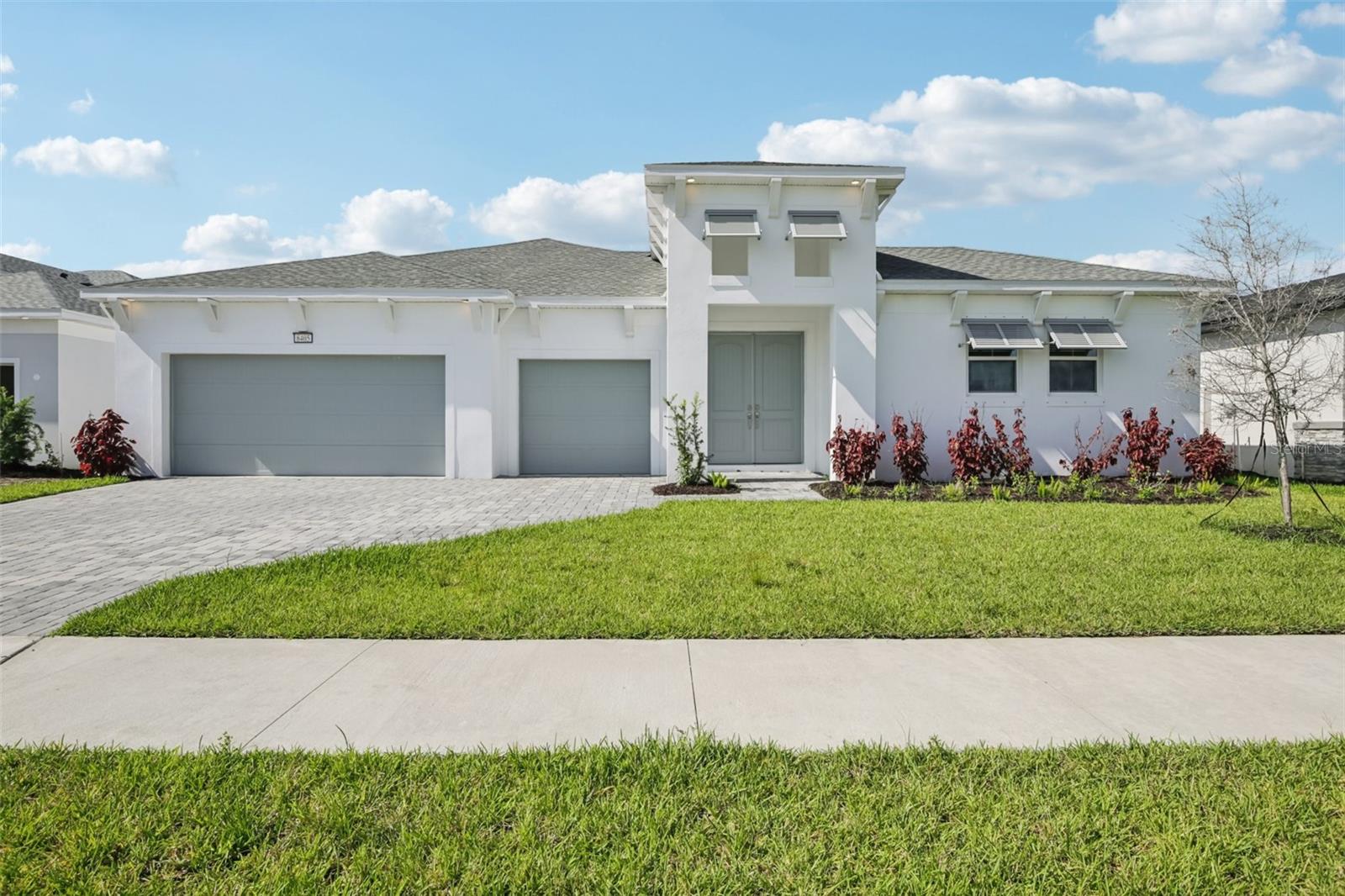 Impressive Single Level Home with 3 Car Front Load Garage! The covered porch leads to the covered courtyard entry that opens to the generous foyer and expansive family room. The well-appointed kitchen features a walk-In pantry, large island and is open to the adjoining dining room with access to the covered outdoor dining area. The primary suite features an en suite bathroom with walk-in shower, private water closet and 2 separate closets. Two secondary bedrooms, full bathroom, laundry room, and powder room complete the 1st floor. A 4th bedroom and pool bath with shower is located behind the detached 1 car garage.