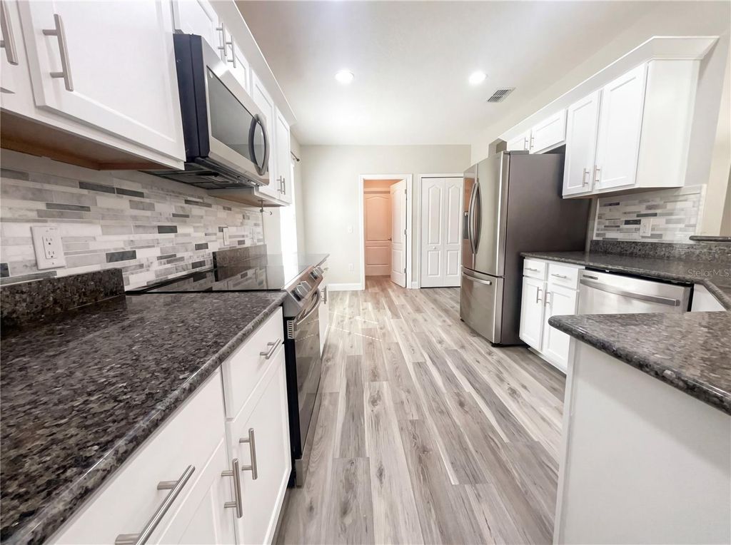 Photo of 15193 Mille Fiore Boulevard, Port Charlotte, FL 33953 (MLS # O6388213)