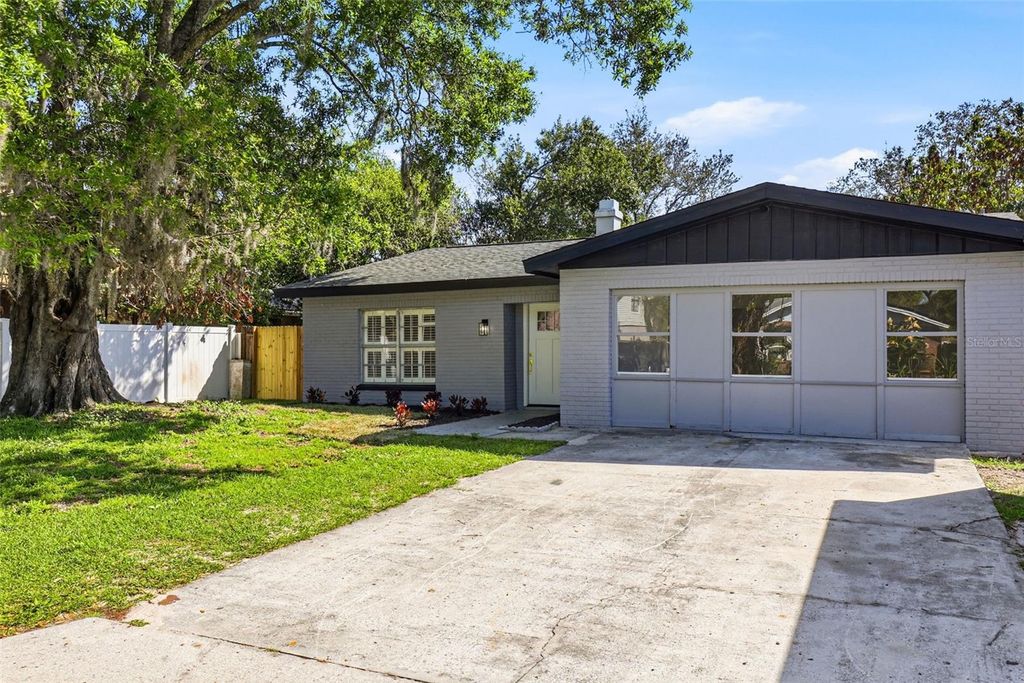 Photo of 10217 N Pawnee Avenue, Tampa, FL 33617 (MLS # TB8485474)