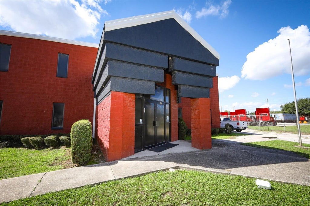 Photo of 2895 Mercy Drive, Orlando, FL 32808 (MLS # O6440389)