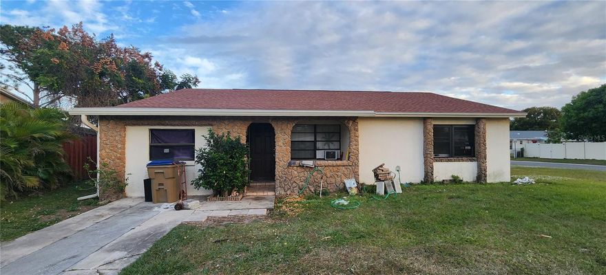 Investor alert — value-add opportunity in the heart of Kissimmee. This 3-bedroom, 2-bath home at 107 Iguala Drive is being sold AS IS, with the seller making no repairs. The property is in distress condition and will require extensive renovation, making it an ideal project for investors, re-habbers, or buyers looking for a full overhaul.  If you're looking for a project with real upside as a primary home, this 3-bedroom, 2-bath home offers a chance to create the dream home you’ve always imagined. 

The home features a newer roof (replaced a year ago), new windows in one bedroom, and the garage has been converted into the third bedroom, offering additional living space. Beyond that, the interior will need comprehensive updates, including new kitchen, bathrooms, electrical system, plumbing repairs, Central AC replacement, extensive cleaning, pest treatment, and full cosmetic restoration. This property is perfect for those who know how to transform potential into profit.

Comparable homes in updated, clean, move-in ready condition are valued around $335k to $360k, giving investors solid upside once renovations are complete. With strong rental demand and continued growth in the area, this home offers multiple exit strategies — flip, hold, or rebuild the interior to suit your portfolio.  Conveniently located near major roadways, schools, and shopping, this home is positioned for long-term value once revitalized.  Bring your vision, your crew, and your renovation plans. Opportunities with this kind of margin don’t last long.  Buyer responsible for verifying all measurements and information.