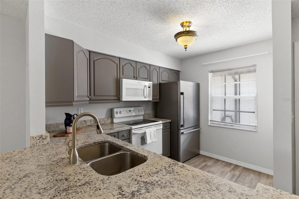 Photo of 3137 Mission Grove Drive, Palm Harbor, FL 34684 (MLS # TB8542544)