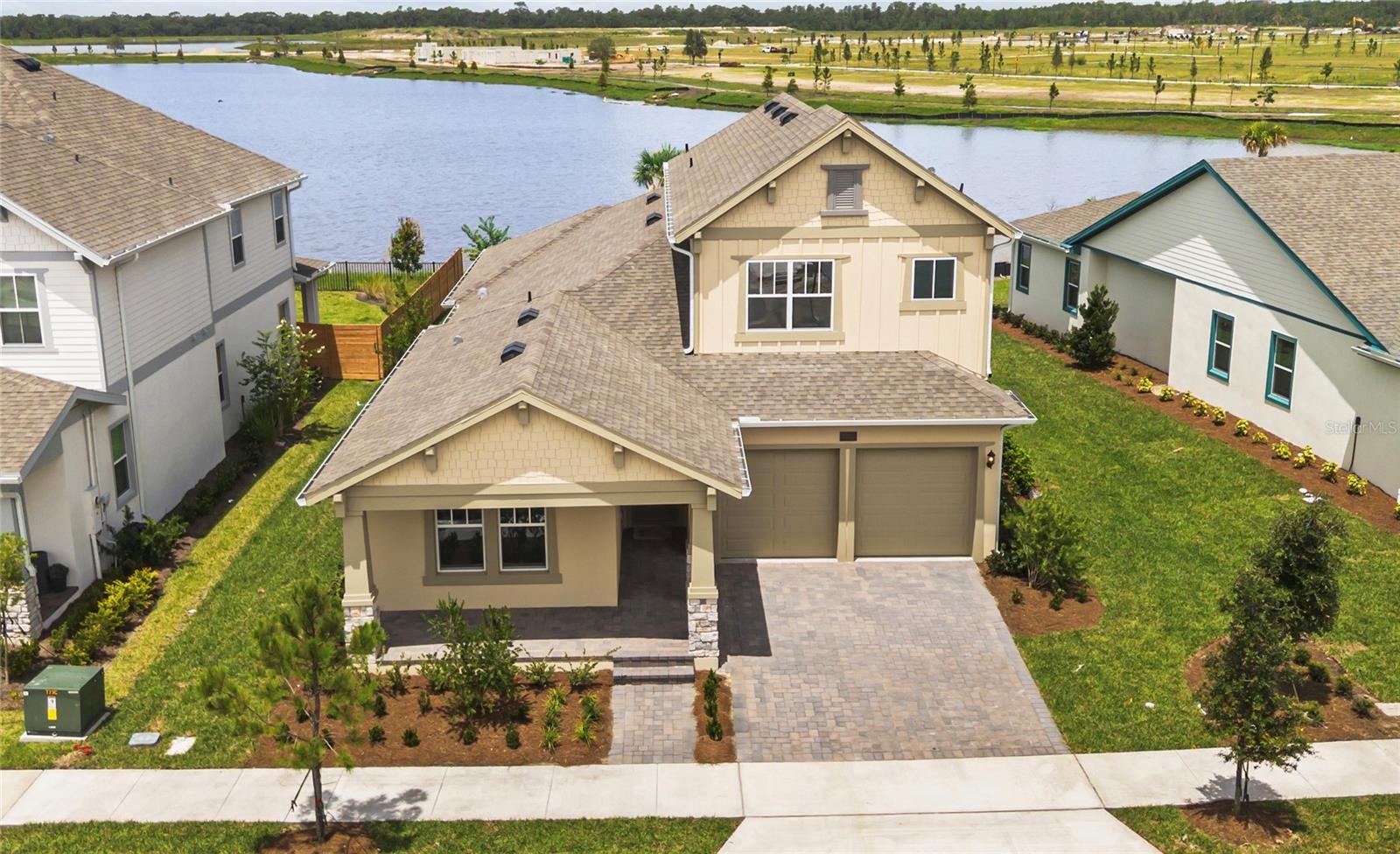 This brand-new 5-bedroom, 3.5-bath home combines comfort, style, and convenience in Laureat Park, Lake Nona's most desirable community. With a modern open layout, upgraded finishes, and a relaxing soaking tub in the master suite, every detail was designed for your lifestyle. Enjoy stunning lake views from the backyard, and walk to top A rated schools just steps away. A playground sits right next door, and the community clubhouse offers resort-style amenities. A perfect home for families looking for quality, space, and an unbeatable location.