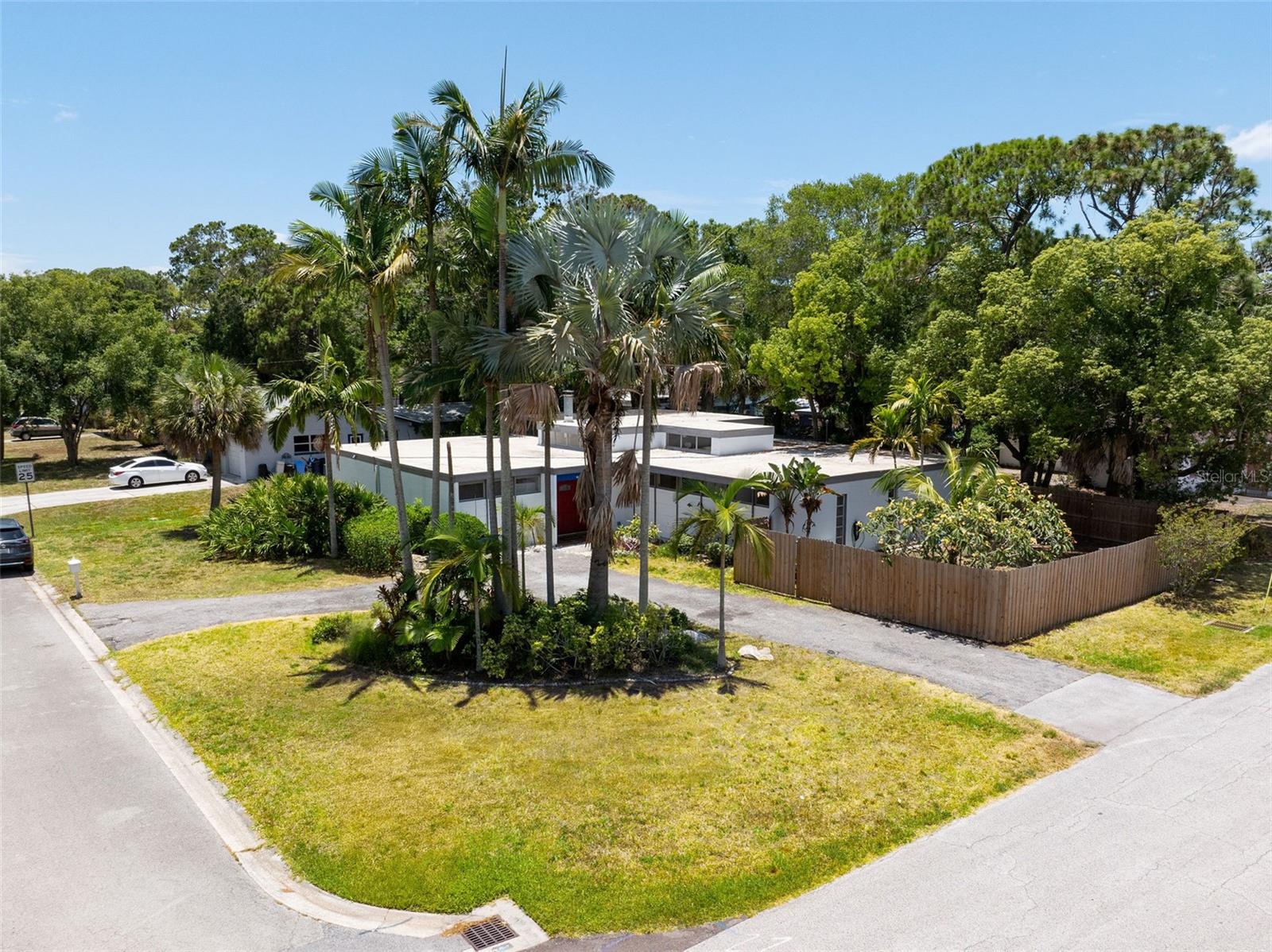 THIS HOME IS NOT IN A FLOOD ZONE was left fully unaffected by Milton and Helene.
This Mid-Century Modern Frank Lloyd style home was commissioned by Lowell Lytle, the actor that impersonated the captain of the Titanic for the company that went down to the wreck!
It has now been fully remodeled and it boasts 5 bedrooms (3 of which are true Primary bedrooms with en-suite baths) and 4 full bathrooms!
Full of natural light thanks to its unique architecture, that leads to a 12-ft-tall atrium complete with beautiful faux stone walls and live trees planted.
The adjacent 37 feet long living room with its high ceiling, with plenty of windows up top and 2 large sliding doors that open up to the outside covered deck, patio and pool, harmoniously blend the interior space with the exterior nature just as Frank Lloyd Wright intended.
You will be able to live the Florida life protected by the newly rescreened pool cage with your doors fully open. The long new galley kitchen opens up to the living room and is ready to entertain your guests
The owner also had the floors updated with new vinyl planks throughout.
The lot is fully fenced-in and there is plenty of grass space in addition to the screened-in pool area. You will be welcomed by beautiful palms and plants in the front of the home and by a long circular driveway for your cars.
The list of recent improvements is really extensive to be able to list them all in such a small space. Come and see this rare jewel in person.