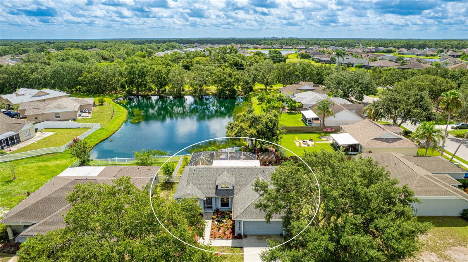 Experience the ultimate in Florida indoor-outdoor living with this beautifully updated 3-bedroom, 2-bath pool home in the desirable Gates Creek community. Nestled on a peaceful waterfront lot with lush landscaping and mature trees, this move-in ready home offers 1,376 square feet of open, airy space filled with natural light and coastal charm. Inside, you'll find stylish laminate flooring, vaulted ceilings, and a thoughtfully updated kitchen featuring refaced cabinetry, granite countertops, a tile backsplash, and newer appliances. The open-concept living and dining areas flow effortlessly into the backyard retreat, creating the perfect layout for entertaining or everyday comfort. Step outside to a private oasis where an expansive screened lanai leads to a sparkling fiberglass pool, grilling station, pergola, patio seating, and firepit, all surrounded by vibrant gardens and tranquil pond views. The fully fenced yard is ideal for pets, play, or simply enjoying the outdoors. Additional upgrades include hurricane-rated shutters, updated bathroom vanities and fixtures, ceiling fans throughout, and a 25-year roof warranty with 19 years remaining. The split-bedroom floor plan provides privacy for guests, while the primary suite features an en-suite bath and beautiful backyard views. Lovingly maintained and optionally available furnished, this home is perfectly situated just minutes from Lakewood Ranch, top-rated schools, Fort Hamer Park and boat launch, shopping, dining, medical facilities, and everyday conveniences. Enjoy easy access to the Gulf Coast’s finest attractions, including the white-sand beaches of Anna Maria Island and the vibrant arts and culture of downtown Sarasota. With a low HOA and no CDD, this is an outstanding opportunity in a truly ideal location. **THIS PROPERTY QUALIFIES FOR A 1% LENDER INCENTIVE IF USING PREFERRED LENDER. INQUIRE FOR MORE DETAILS.**