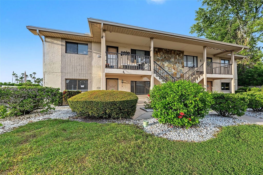 Photo of 9930 Eagles Point Circle #1, Port Richey, FL 34668 (MLS # TB8550901)