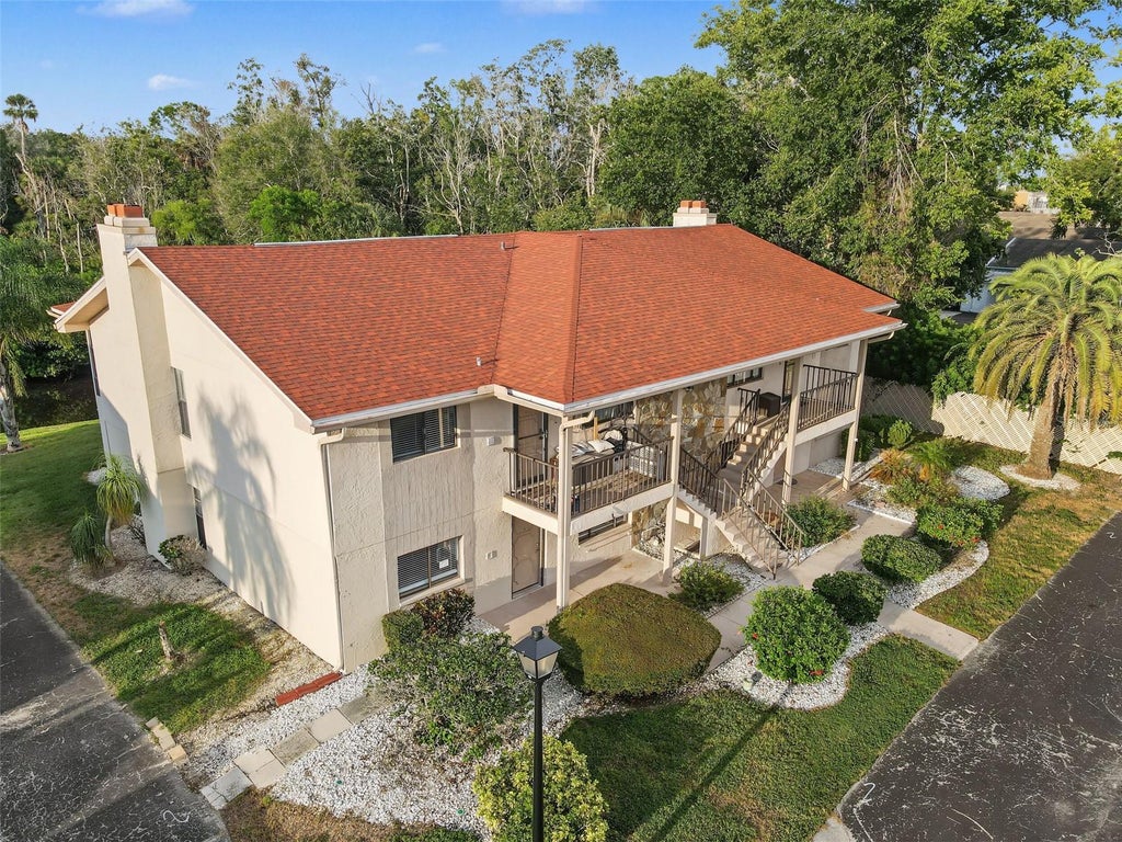 Photo of 9930 Eagles Point Circle #1, Port Richey, FL 34668 (MLS # TB8550901)