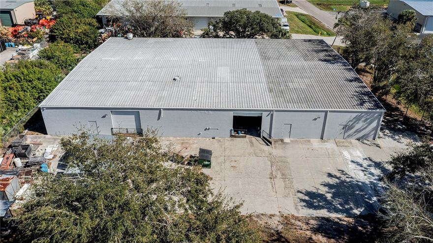 OPPORTUNITY KNOCKS, ONE OF A KIND CONCRETE WAREHOUSE in Whidden Industrial Park zoned INDUSTRIAL without any HOA dues and a METAL ROOF! This building has FOUR massive 12 x 12 ROLLUP BAY DOORS for large commercial trucks to load or unload for unlimited possibilities plus 4 other exit doors in warehouse for workers. Huge INCOME potential to sublet offices, shipping center, storage space, trucking businesses or subdivide. This huge building has 8 air conditioned offices, most are lockable, 3 restrooms, securely FENCED and MONITORED WITH 16 CAMERAS oversized property with 14,000 sq ft under building and over 9,000 sq ft of concrete for parking area! Waiting area, conference area, kitchenette, heavy duty pallet racking included, plus there is a stairways to multiple second levels which is built heavy duty to hold serious weight adding around 6,000 sq ft of usable space! Entire warehouse is well lit with over 120 commercial grade lighting. Oversized lot is 202 x 209 so room for expansion! Two separate a/c units are on site. Owner is currently been international distributor successfully for over 10 years at this location. A quick 5 minutes to I-75 and US 41, with gas station before you hit US 41, you cannot beat this location! Business placard easily visible from the road. Serious inquiries please, close to the new Sunseeker resort, auditorium, and community events. The Punta Gorda Regional Airport, served by Allegiant Air, is located a mere 12.3 miles away and Tampa Bay training stadium. Explore this spectacular IG business location with diverse space that has truly been utilized successfully with more potential for the next owner, don't delay, call to schedule your showing today .
