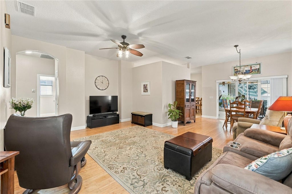 Photo of 14151 Chicora Crossing Boulevard, Orlando, FL 32828 (MLS # O6450849)