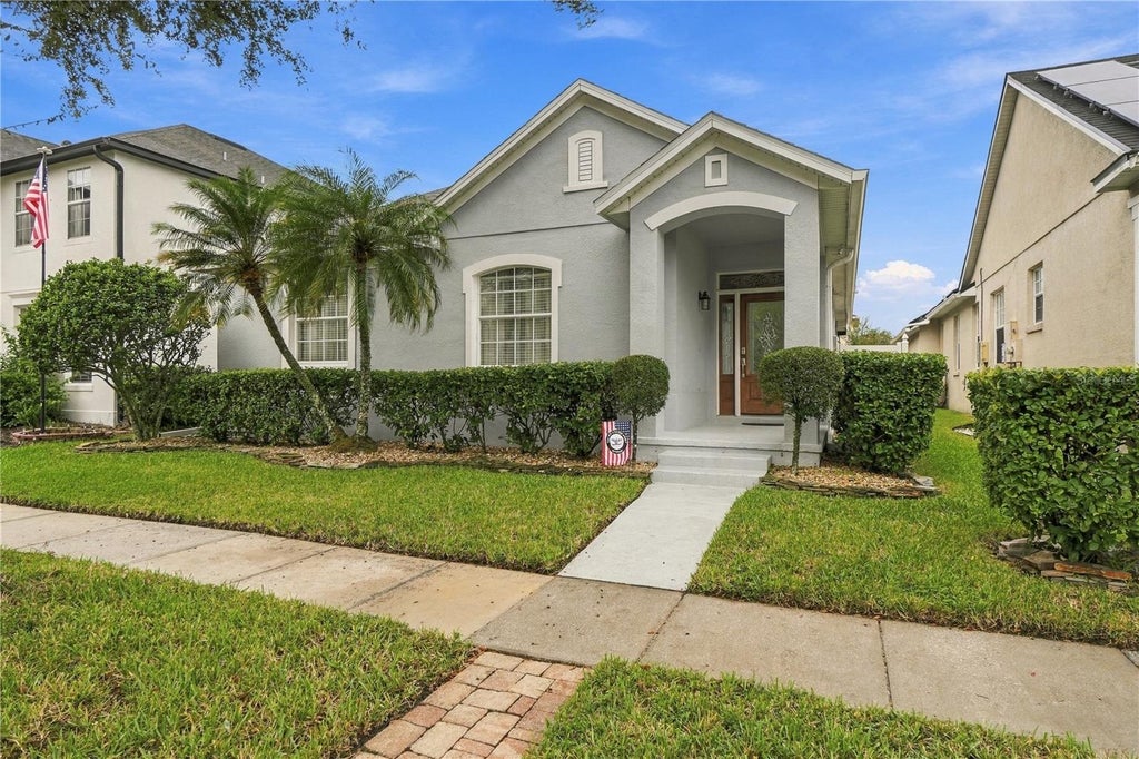 Photo of 14151 Chicora Crossing Boulevard, Orlando, FL 32828 (MLS # O6450849)