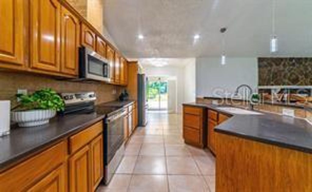 Photo of 14208 Mayer Avenue, Hudson, FL 34669 (MLS # TB8456475)