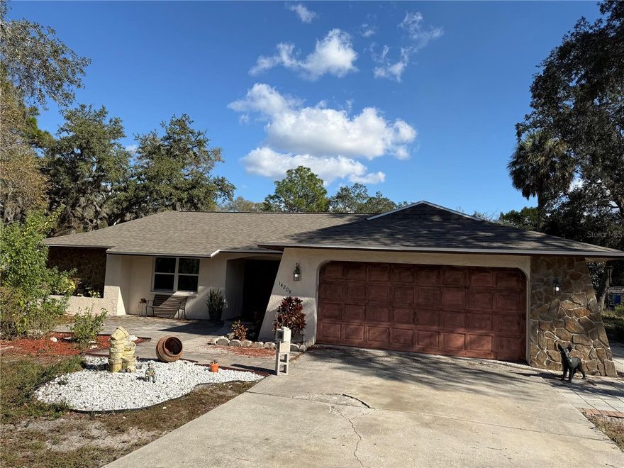 Welcome to a beautifully maintained home Completely renovated; acreage (1.86 acres), 3 bedrooms, 3 bathrooms, 2-car garage, providing ample living space. The residence includes a large living area and fireplace, along with two large sheds and a dedicated pump house for additional storage and utility needs. The property is zoned AR (agricultural-residential) under Pasco County code, providing flexibility for owners. AR zoning allows for both single-family residences and mobile homes, while also permitting agricultural and accessory uses, giving buyers the ability to adapt the property to a wide range of residential needs, from small-scale agriculture to other uses. With its combination of living space, utility structures, and flexible zoning, this property is ideal for a buyer seeking privacy, storage.