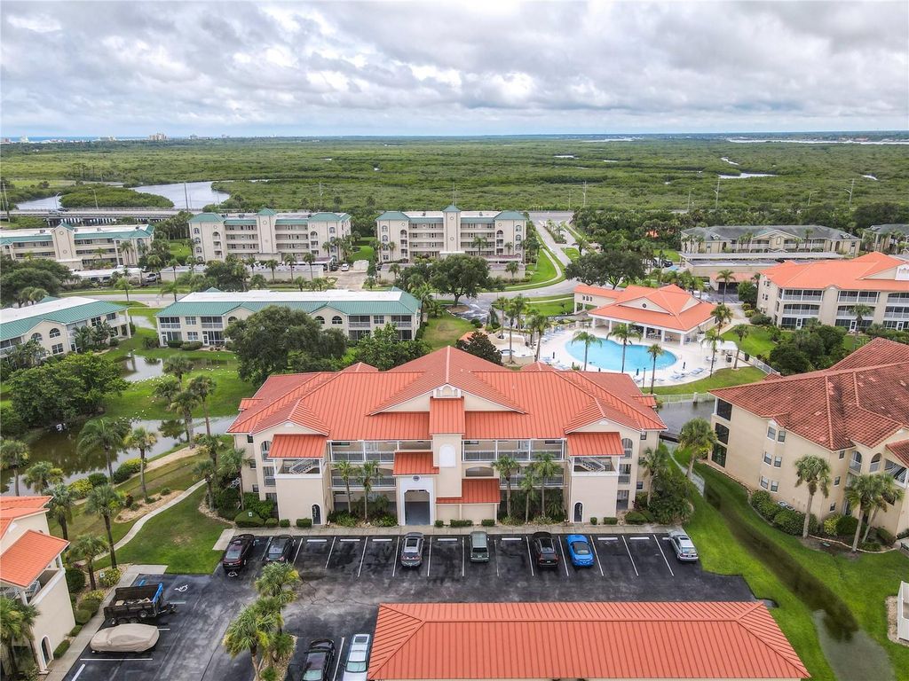 Photo of 445 Bouchelle Drive #104, New Smyrna Beach, FL 32169 (MLS # O6353742)