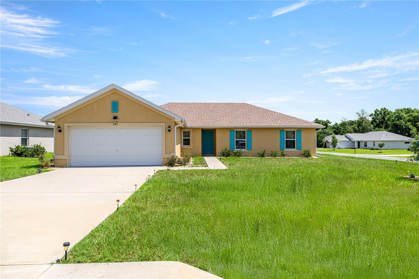 Come home to comfort and style in this beautifully maintained 2022 Lavender model, offering 4 bedrooms, 2 bathrooms, and 1,738 sq ft of living space on a peaceful corner lot in Marion Oaks. Set on a quiet road with city water and sewer, this home features an open, split-bedroom layout, a spacious 2-car garage, and smart upgrades like an irrigation system and added rain gutters. The kitchen flows seamlessly into the main living area, perfect for gatherings or everyday living. Located in a community with a low HOA that covers access to a pool, tennis courts, and trash service, this home delivers both convenience and value in one of Ocala’s growing neighborhoods.
