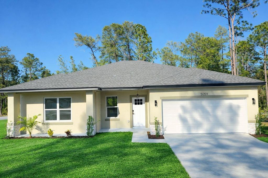 Photo of 5059 SW 166th Loop, Ocala, FL 34473 (MLS # O6383205)