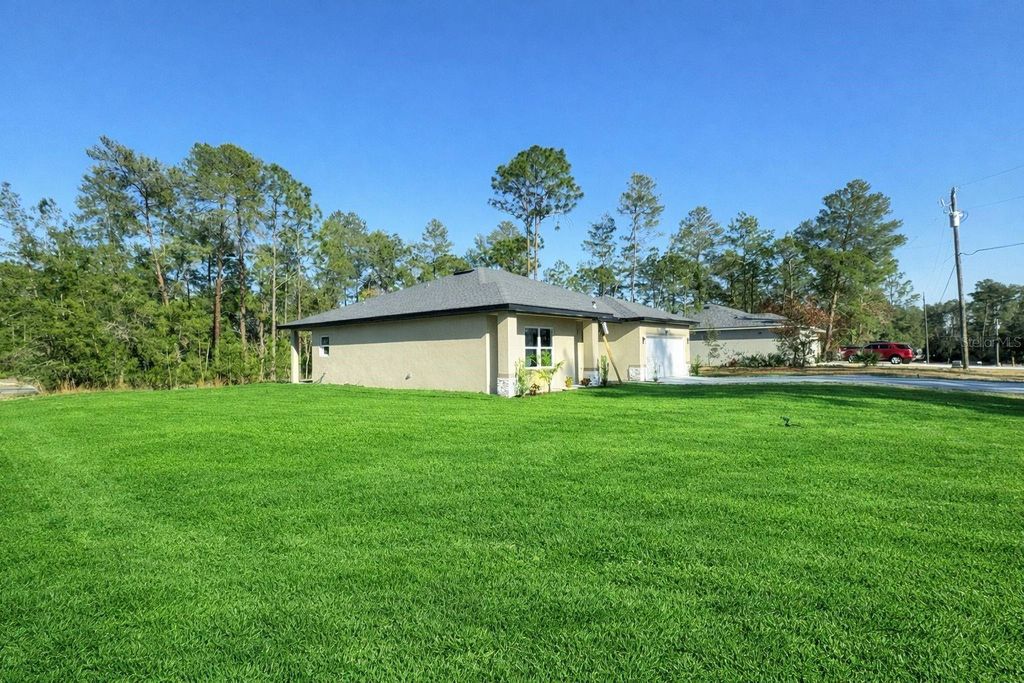 Photo of 5059 SW 166th Loop, Ocala, FL 34473 (MLS # O6383205)