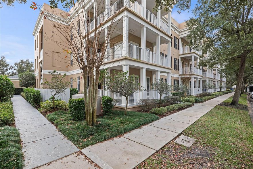 Sought-after first-floor, end-unit condo with a wraparound porch! This two bedroom, two bath residence includes a den/office and a one-car garage! Fall in love with the wonderful open plan featuring gorgeous laminate wood flooring, tons of natural light and no stairs! The open kitchen impresses with a breakfast bar, 42-inch cabinets, stainless appliances and a pantry. Bonus room is perfect for a home office, den, or third bedroom. Built-in book shelves. Retreat to the primary bedroom with an en-suite bath that includes dual sinks and a walk-in shower. Enjoy a morning cup of coffee on the wraparound porch! Building exterior painted 2026. Property is sold As-Is. The property is just a few blocks to Baldwin Park’s restaurants, shops, playgrounds, pool and fitness center. This is a great location situated between downtown Orlando and Winter Park.