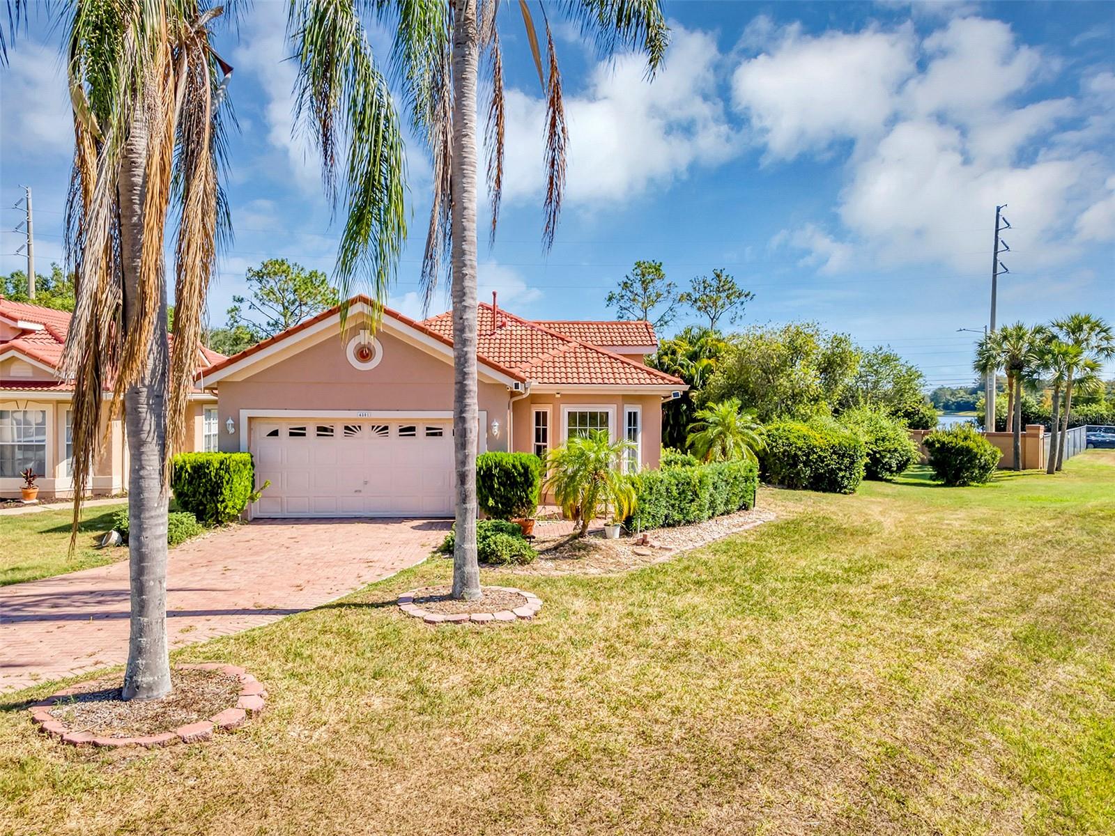 Location, Location & Location. Relatively low HOA that includes Internet, Cable, and Landscaping. This house is a rare find with mesmerizing water views in the heart of Orlando, Florida. No rear neighbor or side neighbor. This location is central to Orlando International Airport, Epic Universe (Projected in 2025), Sea World, Discovery Cove, Aquatica, and much much more. Check out the pictures and fall in love with this house. Act now and schedule a showing. Key features: Spanish Tiles, Water Views, Screened-in Lanai, Laundry Room, High Ceilings, Natural Lights and Bricked Driveway and Sidewalks.