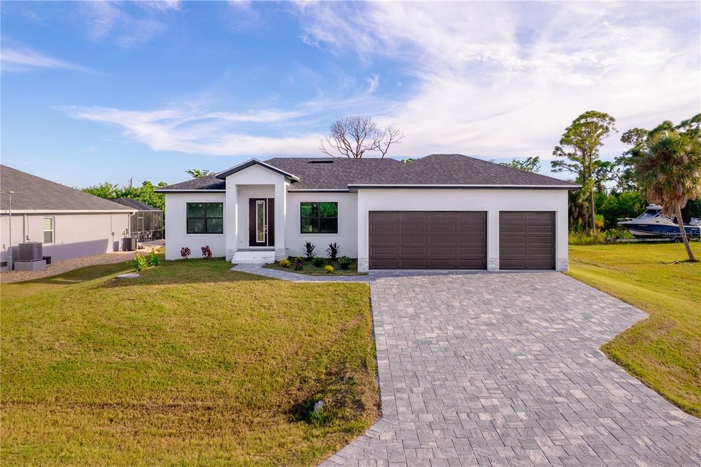 Photo of 15089 Aldama Circle, Port Charlotte, FL 33981 (MLS # C7514901)