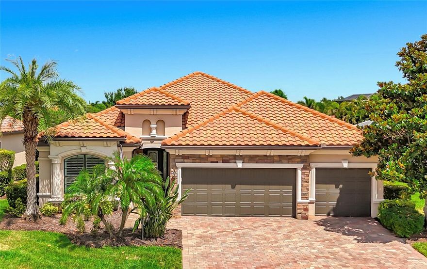 Located in the highly sought-after gated community of Bridgewater at Lakewood Ranch, this stunning 4-bedroom, 2-bath Princeton model perfectly blends luxury, comfort, and the ultimate Florida lifestyle. From the moment you step inside, you’ll appreciate the open and airy floorplan accented by beautiful porcelain plank tile flooring, crown molding, tray ceilings, designer lighting, and all-new ceiling fans throughout the home.

The beautifully appointed kitchen offers 42” cabinetry, granite countertops, stainless steel appliances including a French door refrigerator and gas range, breakfast bar, under-cabinet and above-cabinet lighting, a closet pantry, and a new dishwasher. Adjacent to the kitchen is a spacious dinette area with direct access to the lanai, creating the perfect setting for casual dining and indoor-outdoor entertaining. Open to the spacious great room, this inviting living space is ideal for gathering with family and friends while enjoying seamless access to the private outdoor living area.

Retreat to the oversized primary suite offering a large walk-in closet and a spa-inspired bath complete with dual sinks, soaking tub, and separate shower. Three additional bedrooms provide flexibility for guests, family, or a home office, including custom California Closet features with a built-in Murphy bed, desk, and shelving unit in one of the guest bedrooms.

Step outside to your own private backyard oasis overlooking a tranquil preserve. The travertine-tiled lanai showcases a heated saltwater pool with sun shelf, Pentair automated pool system with color-changing lights, roll-down privacy shades, and a spectacular new one-piece outdoor kitchen designed for year-round entertaining. Additional exterior enhancements include landscape lighting in both the front and rear yards, a paver driveway and walkway, fenced dog run, tile roof, and maintenance-free living for added convenience.

Additional upgrades include a new washer and gas dryer, automated sliding glass door blinds, surround sound wiring, Nest thermostat, Ring doorbell, interior and exterior camera system, garage storage upgrades, overhead storage, and more.

Bridgewater residents enjoy a maintenance-free lifestyle with convenient access to shopping, dining, top-rated schools, medical facilities, golf, parks, walking trails, and everything Lakewood Ranch has to offer. This exceptional home truly shows like a model and is ready for its next owner to move right in!