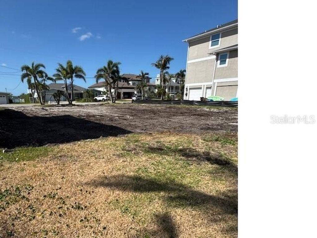 Photo of 35 Sunset Bay Drive, Belleair, FL 33756 (MLS # O6356163)