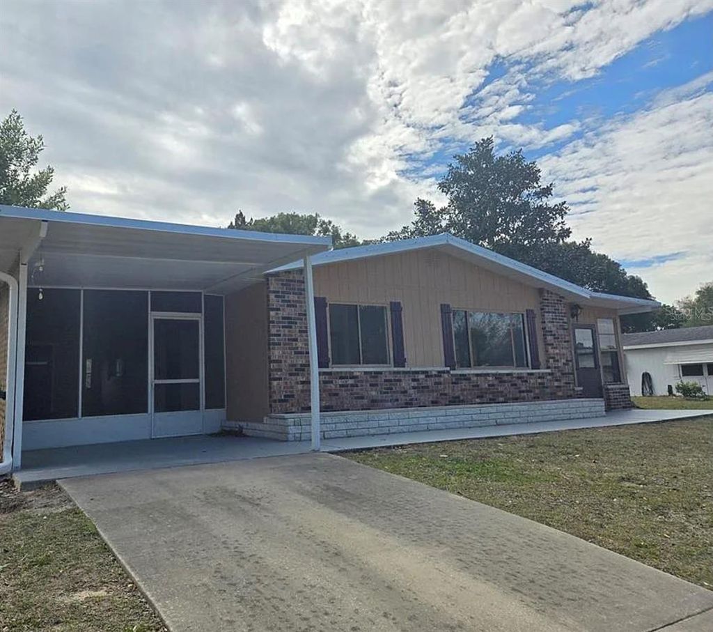 Photo of 9050 SW 101st Lane, Ocala, FL 34481 (MLS # O6409147)