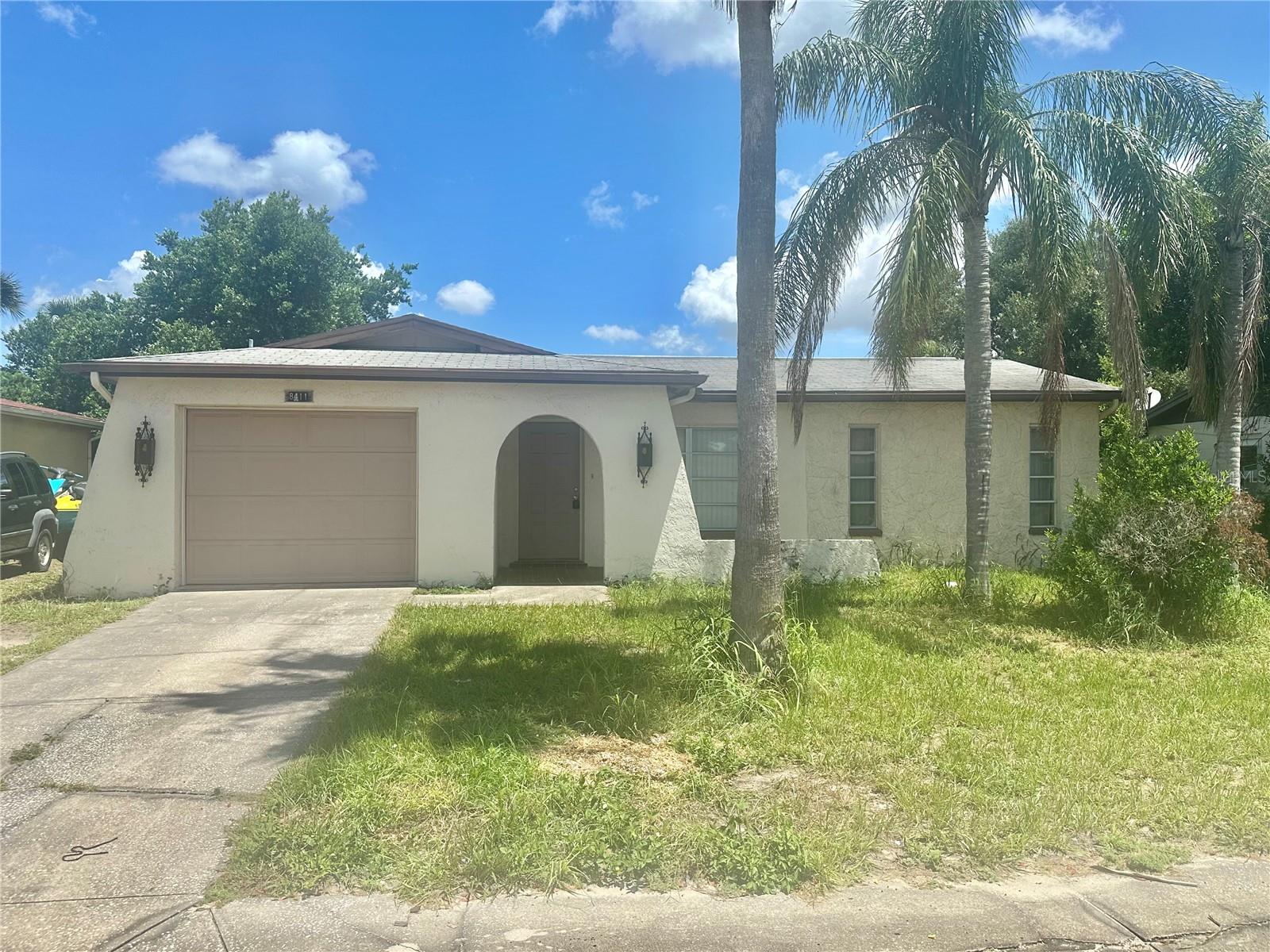 ESTATE SALE, Fixxer Upper, Cash only offers. There are multiple offers and are asking for any interested buyer to make their highest and best offer by 4 PM Monday 7/28/2025. Bring your vision and totally renovate this 3 Bed/ 2bath screened pool home. Master has ensuite bath with step in shower. No Flood zone or water damage during recent storms. Screened pool in clean working condition. A/C is 12 years old. Roof is 21 years old. This home can be restored better then before and be an excellent year round, vacation, retirement or investment home. Centrally located close to shopping, banking, beaches, and golf courses.