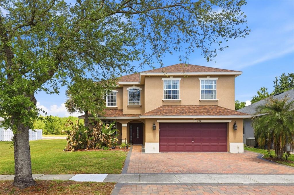 Photo of 824 Lake Biscayne Way, Orlando, FL 32824 (MLS # O6402601)