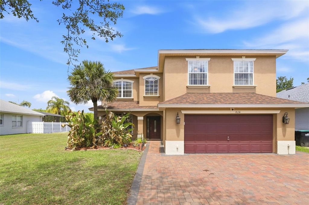 Photo of 824 Lake Biscayne Way, Orlando, FL 32824 (MLS # O6402601)