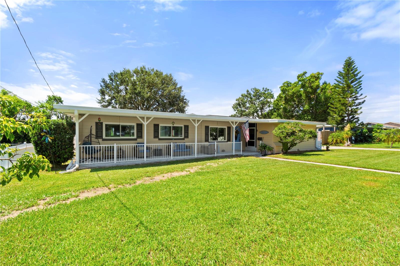 Welcome home! This 3 bed 2 bath home features a updated kitchen and large permitted living room addition in 2015. It has been well maintained new Front Porch in 2022, Kitchen in 2023, Floors in 2023, Roof in 2019. RV carport added in 2021 with Electricity. Large fenced in back yard for kids and dogs. Side screened in porch foe a relaxing evening drink or cook out. Very Low electric bill with SOLAR PANELS THE THE SELLER IS PAYING OFF AT CLOSING WITH ACCEPTED OFFER.