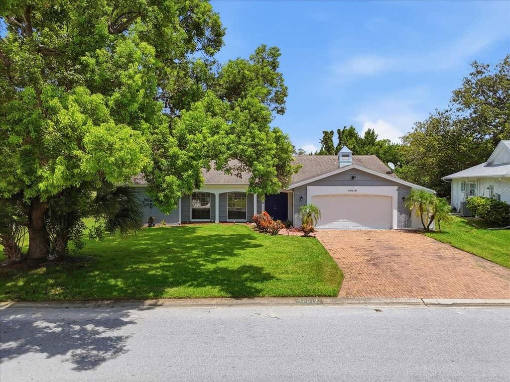 Photo of 13010 Pebble Beach Circle, Hudson, FL 34667 (MLS # L4964218)