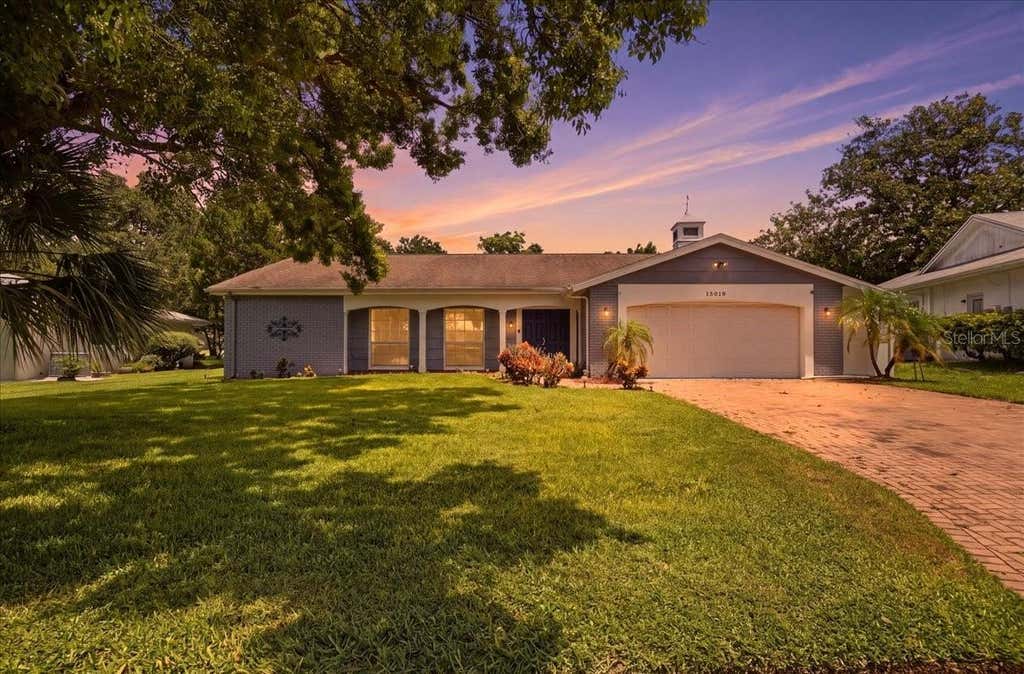 Photo of 13010 Pebble Beach Circle, Hudson, FL 34667 (MLS # L4964218)