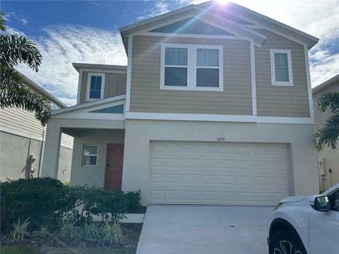 Photo of 1572 Ellesmere Avenue, Haines City, FL 33844 (MLS # O6411415)