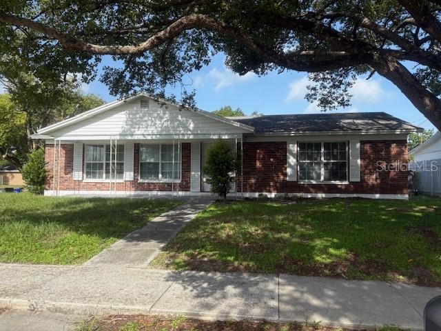 3BR/2BA Single Family home with 2 car garage, new carpet, fresh paint, new vanities in the bathrooms, and a screened lanai.