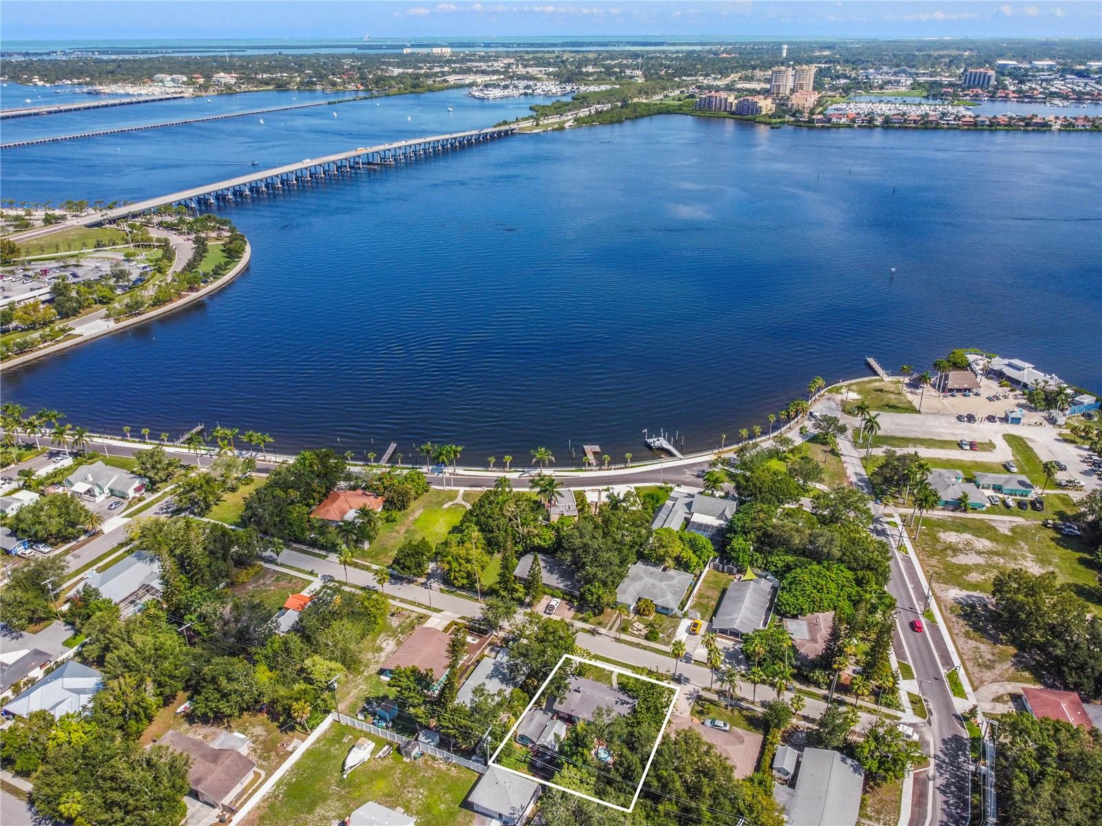 Seller may consider owner finance option. Located one block from the Manatee River and Riverwalk, East side of Manatee Memorial Hospital, near a Gulf Islands Water Ferry's location. Great option for investment and/or 1031 exchange, previously rented for over $3000 per month. Primary home is configured as a 2 bedroom plus a bonus room for possible 3rd bedroom or office and a bathroom. Separate one room cottage with kitchenette and full bath. Solid surface flooring throughout for easy care and cleaning. Features granite kitchen counters. Set-up and zoning allows for a variety of uses. So convenient to downtown Bradenton, Dining, Hospital and Business district, I-75, Shopping, Anna Maria Island, Bradenton Beach, Holmes Beach. No HOA and no CDD fee! Book your showing today!