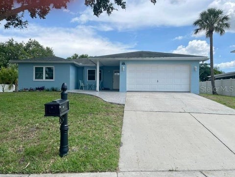 Photo of 1713 Mapleleaf Boulevard, Oldsmar, FL 34677 (MLS # TB8523949)