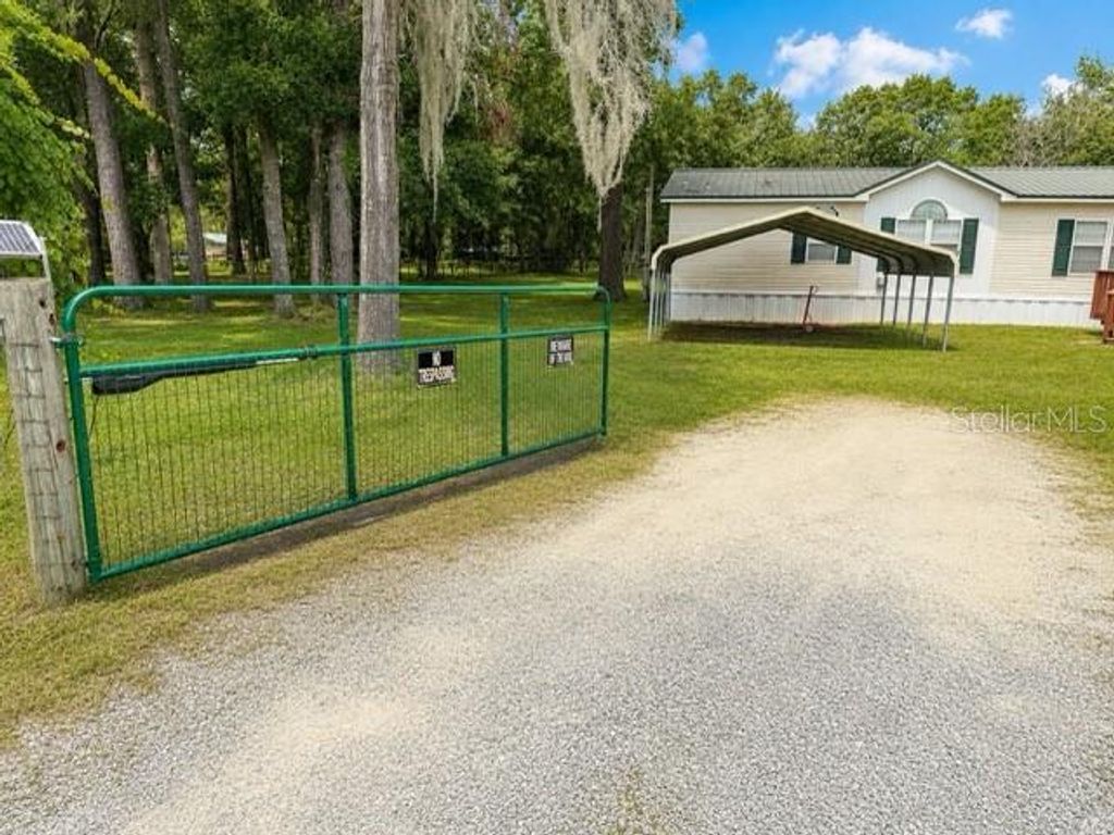 Photo of 13315 NE 30th Court, Anthony, FL 32617 (MLS # O6418482)