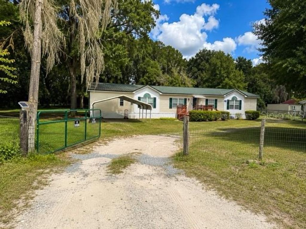 Photo of 13315 NE 30th Court, Anthony, FL 32617 (MLS # O6418482)