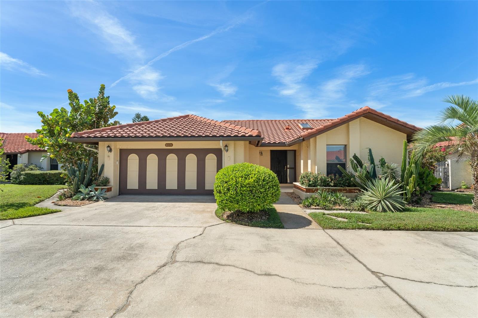 Location, Location, Location! Discover this gorgeous 3-bedroom, 2-bath pool home in the heart of Dr. Phillips, located in the sought-after Granada Villas community. This charming Spanish Mediterranean residence features an open-concept layout with a split-bedroom floor plan, offering both style and functionality.
Step inside to find neutral-toned walls and beautiful wood flooring, making this home truly move-in ready. The spacious living room flows seamlessly into the dining area, creating the perfect space for entertaining. The updated kitchen boasts brand-new quartz countertops, newer appliances, and sliding doors that open to a large backyard—ideal for outdoor enjoyment.
The private primary suite, situated at the back of the home, is generously sized to accommodate a sitting area or home office.
Granada Villas offers residents a private recreation area complete with a boat ramp to Little Sand Lake and tennis courts. Perfectly positioned just off Sand Lake Road, you’ll be walking distance to premier shopping, Starbucks, Barnes & Noble, and the renowned Restaurant Row. Plus, this home is located in a top-rated school district.