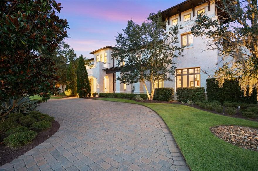 The epitome of all things luxury, this 12,000 sq.ft. Akers Custom Homes estate features 6 bedrooms, 6/4 bathrooms, 4-car PLUS golf cart garage, & comes complete w/ interior guest quarters. Located in the world class Lake Nona Golf & Country Club on .76 acres, this elegant property is simply waiting for you to call it home. Magnificently manicured landscaping leads you up the circular driveway to a grand, custom designed double door entry into a towering foyer. A glittering chandelier w/ wood inlayed ceilings adorns the formal dining room to your right. Continue to the exquisite living room w/ 24-ft ceilings, double-sided fireplace, chic bar w/ onyx countertop & custom cabinetry, & expansive windows overlooking the resort-style pool w/ flowing water wall. A unique centerpiece of the home, that is sure to please sommeliers & casual wine drinkers alike, is the one-of-a-kind glass & steel, two-story, walk-in, temperature-controlled wine cellar. On the other side of the fireplace is the owner’s retreat. Private & grand, the owner’s suite includes its own vestibule, sitting room, access to private lanai overlooking the pool, & breakfast bar all of which are flooded w/ natural light through large windows. The oversized master bathroom features separate dual vanities, walk-in glass shower w/ double shower heads, stand-alone jetted marble soaking tub, & a striking chandelier w/ custom wood-inlays adorns the ceiling. Continue into the “his & hers” walk-in closets w/ custom storage & your own private laundry room separate from the two other laundry facilities in the home. A rich home office w/ elegant wood built-ins & a wooden inlayed coffered ceiling completes the left wing of the first floor. The right wing of the home includes an oversized family room/kitchen combo. Serving as the heart of the home, the kitchen is a chef’s dream w/ a 16-ft center island & appliances from coveted brands such as Wolf, Fisher & Paykel, Thermador, & Miele. Next to the cozy breakfast nook w/ a custom circular bench you’ll find a light, bright & airy den w/ its own private patio & bubbling fountain tucked away behind hidden cabinets. Around the corner you’ll find a first-floor laundry room w/ ample storage & elegant wooden pocket doors. Take the elevator or the winding staircase to the second floor where you’ll find the top portion of the two-story wine cellar w/ frosted glass floors & brilliant chandelier. Step out into the billiards room w/ fireplace, commercial grade bar, & theater room w/ drop-down projector. The whole house is supported by an automated Crestron Security & Smart Technology system. Across the gallery bridge you’ll find yet another game room behind large double doors w/ its own private balcony. Completing the second floor are four bedrooms w/ private en-suite bathrooms, an upstairs laundry room, & completely private guest quarters w/ kitchenette, living room, bedroom & bathroom. Downstairs, through glass sliding doors, you’ll find an outdoor living room & kitchen complete w/ bar & grill, fireplace, & retractable screens to enclose the space on warm summer evenings. A resort style pool & spa w/ water wall feature & fire pit spreads out from the outdoor living space into the large backyard. Lake Nona CC is renowned for its meandering roads shaded by a canopy of oak trees & one of the region’s most exclusive private clubs, & is conveniently located near the International Airport, Lake Nona Medical City and just 30 min. from Downtown Orlando. Room Feature: Linen Closet In Bath (Primary Bathroom). Room Feature: Linen Closet In Bath (Primary Bedroom).