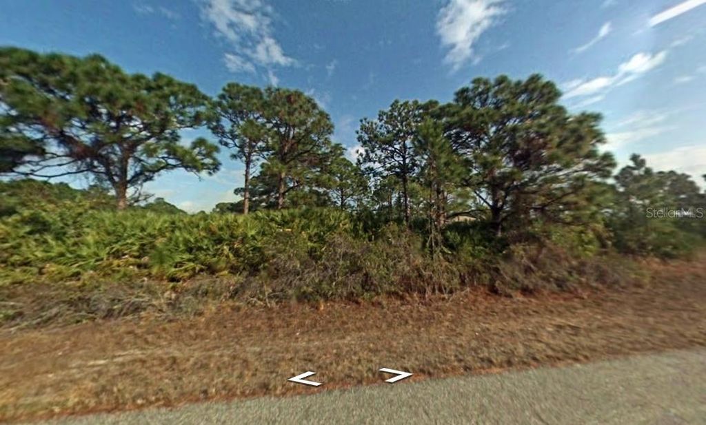 Photo of 12060 Benham Avenue, Port Charlotte, FL 33981 (MLS # C7515894)