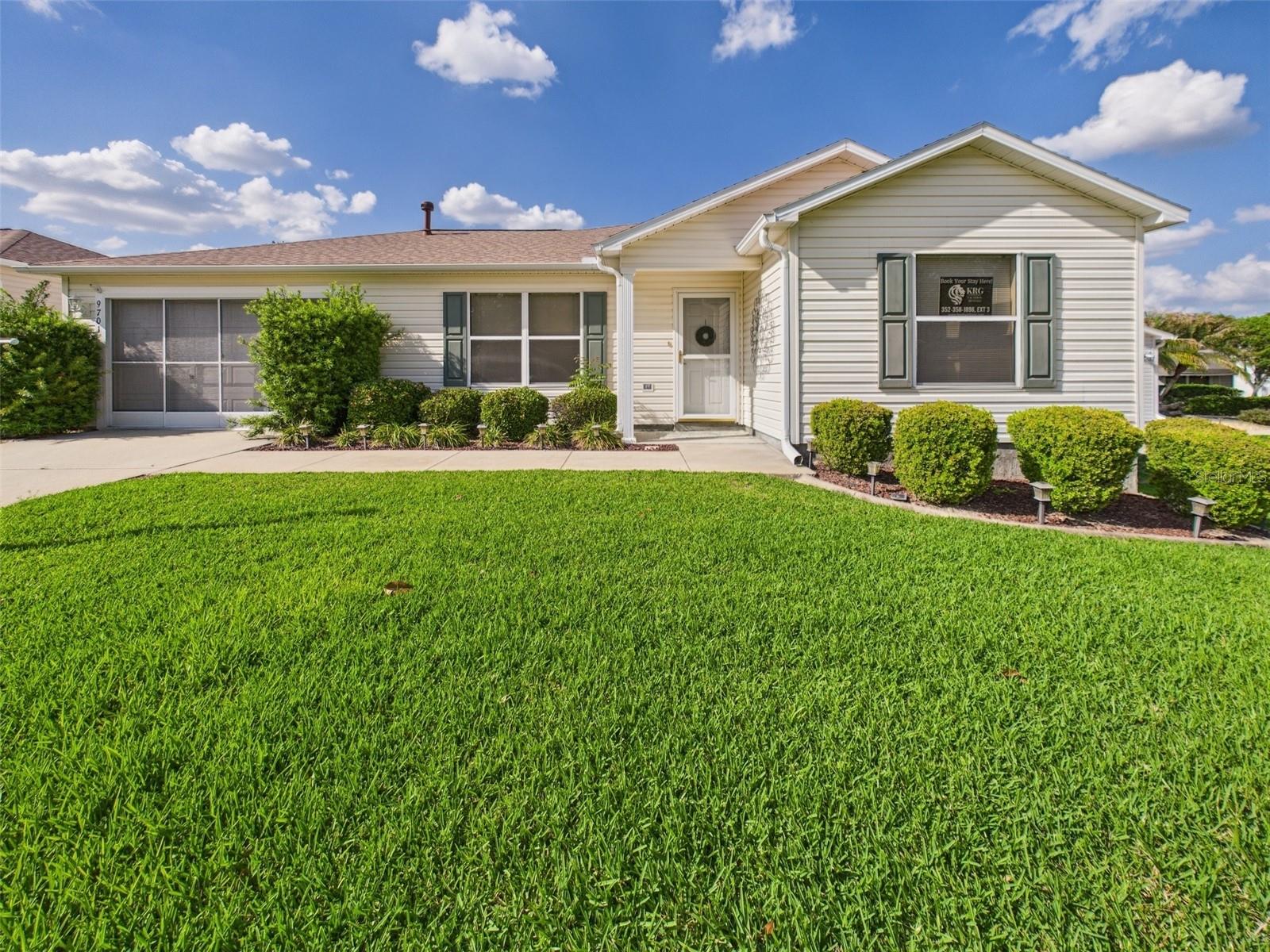 Enjoy the best of The Villages lifestyle in this charming and fully furnished 2-bedroom, 2-bath home, perfectly situated just minutes from both Spanish Springs and Lake Sumter Landing town squares. Inside, you’ll find an open and inviting layout with beautiful laminate flooring throughout the main living areas, creating a warm and low-maintenance space to relax and entertain. The spacious living room flows seamlessly into the dining area and fully equipped kitchen, making everyday living a breeze. The comfortable primary suite features an en-suite bath and generous closet space, while the second bedroom is ideal for guests or a home office. A screened-in patio porch offers the perfect spot for morning coffee or unwinding in the evenings while enjoying the Florida breeze. This home comes fully furnished with tasteful décor and even includes a golf cart so you can easily enjoy all the amenities The Villages has to offer, from golf courses and recreation centers to shopping, dining, and nightly entertainment.