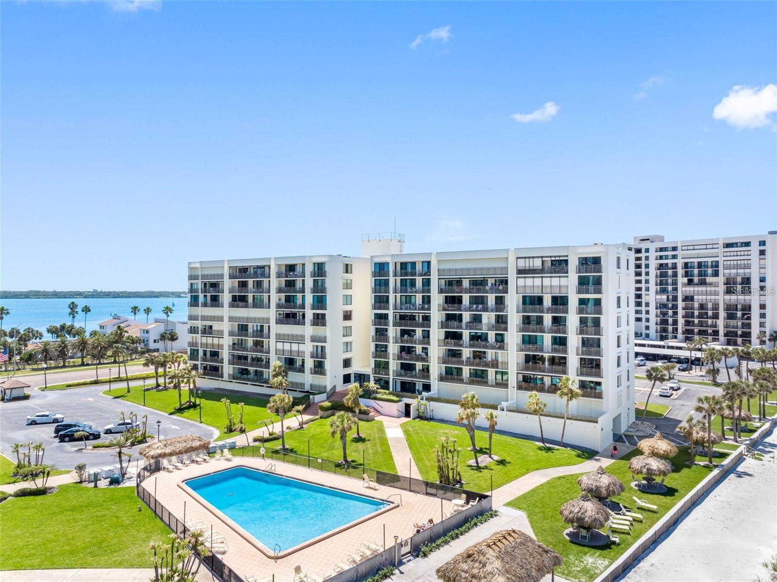 AVAILABLE August 1st, 2025, for an annual lease! Updated and DOG FRIENDLY, this 2BR 2BA beach retreat is situated in an ideal oceanfront location in the heart of sand Key. The floorplan is open and features beautiful tile throughout and floor to ceiling sliding doors that access a 37-foot balcony with great views of the Gulf and Intracoastal. There are stainless steel appliances in the kitchen and the bedrooms are among the most spacious that you will find on Sand Key. No need to leave your best friend at home as this property allows 1 dog with a max weight of 20 lbs. South Beach II is a well-maintained gated community with tropical landscaping, heated resort style pool, and tiki huts to enjoy breathtaking sunsets. Unfurnished and strictly no smoking. Call now to schedule your tour!