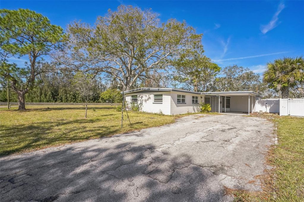 Photo of 131 80th Avenue NE, St Petersburg, FL 33702 (MLS # TB8445671)