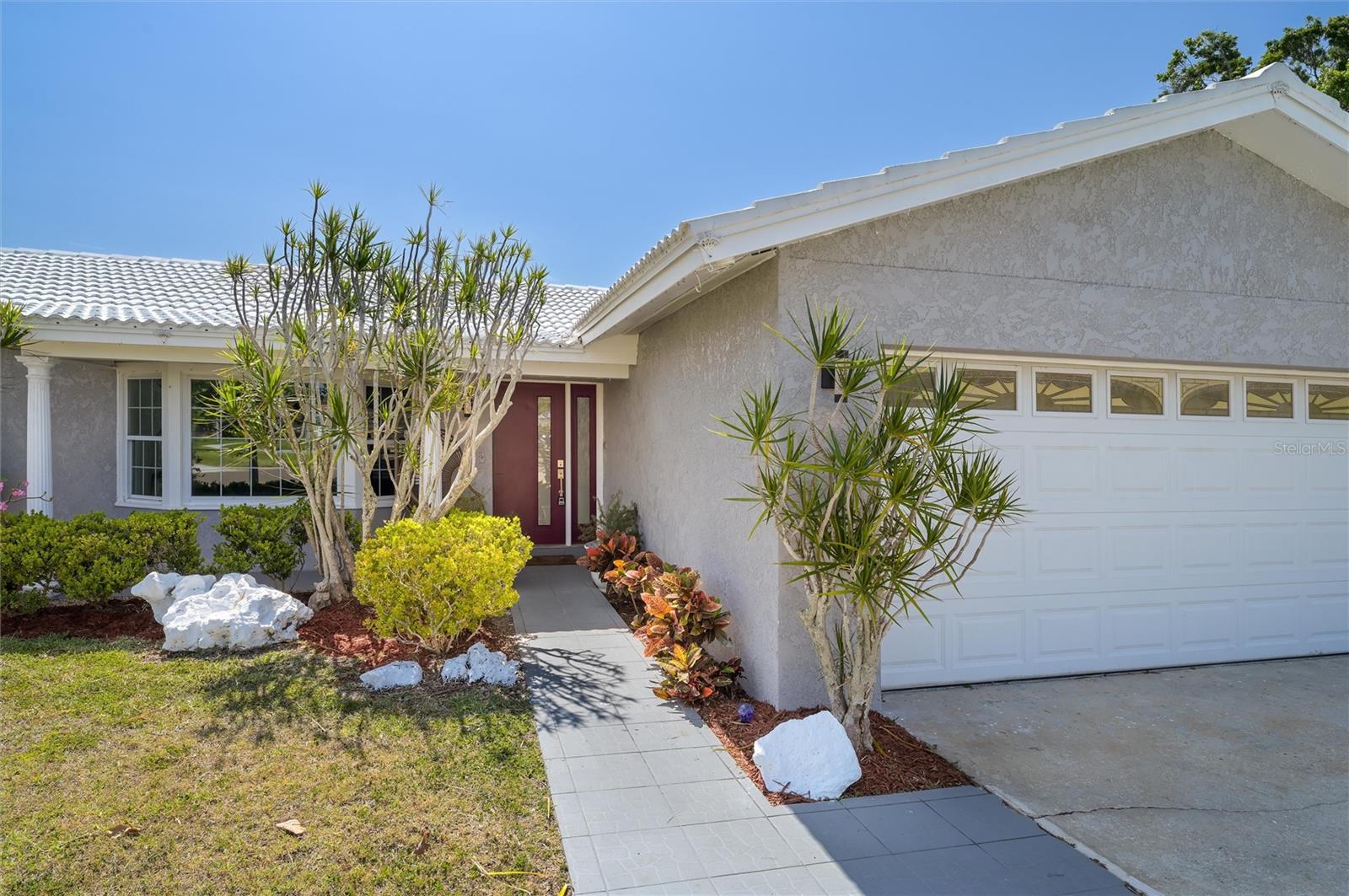 Welcome to your waterfront oasis in beautiful Treasure Island! This 3-bedroom, 2-bath home offers approximately 2,024 sq. ft. of bright, open living space on an oversized 0.23-acre lot. Perfectly positioned with a sought-after southeast front exposure, the property enjoys warm morning sunlight and cooler afternoons. The spacious primary suite features a private en-suite bath, while the additional bedrooms provide ample space for family or guests. The open-concept living and dining areas flow seamlessly to a large kitchen, ideal for entertaining. Step outside to your backyard paradise with direct water access—perfect for boating, paddleboarding, or simply enjoying the coastal breeze. Just minutes from pristine Gulf beaches, dining, and shopping, this home blends comfort, convenience, and the ultimate Florida lifestyle.