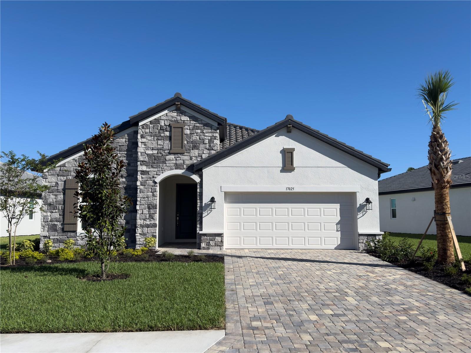 Stunning 4-Bed, 3-Bathroom single story Single Family Home with Water View Patio and attached 2-Car Garage. Welcome to your dream home! This newly constructed single-story residence, completed in 2025, offers the perfect blend of modern design and comfortable living. Located in a serene neighborhood, this 4-bedroom, 3-bathroom gem is the epitome of contemporary elegance and convenience. Interior Features: Spacious Open Floor Plan: Step into an expansive living area that seamlessly integrates the living room, dining room, and kitchen. The open-plan design ensures ample space for entertaining guests or enjoying quality family time. The tray ceilings add to the spacious feel. The floor is luxury vinyl. Gourmet Kitchen: The heart of the home features high-end stainless steel appliances, quartz countertops and custom cabinetry (some house appliances are in process of being installed). Perfect for the home chef and for hosting gatherings. Master Suite: The luxurious master bedroom offers a private retreat with a large walk-in closet and an en-suite bathroom featuring dual vanities, a soaking tub, and a separate glass-enclosed shower. Additional Bedrooms: Three additional generously-sized bedrooms provide plenty of space for family, guests, or a home office. Currently the bedroom are carpeted. Modern Bathrooms: Both bathrooms are outfitted with contemporary fixtures, stylish tiling, and ample storage. Exterior Features: Patio with Water View: Enjoy breathtaking water views from your private patio. This tranquil outdoor space is ideal for relaxing, dining al fresco, or watching the sunset over the lake. The patio will be screened. Attached 2-Car Garage: The spacious garage provides ample room for vehicles and additional storage, ensuring convenience and security. Additional Highlights: New Construction: Built in 2025, this home offers the latest in construction quality and energy efficiency, providing peace of mind and low maintenance. Prime Location: Situated in a peaceful and desirable community, you'll enjoy easy access to local amenities, parks, and schools. Modern Finishes: Throughout the home, you'll find contemporary finishes and thoughtful touches that enhance both aesthetics and functionality. Don’t miss the opportunity to lease this exceptional property that combines modern luxury with serene lakefront living. Schedule a viewing today and envision yourself in this beautiful home! Sweetwater Community has a pool, fitness center and club house for residents and their guests.