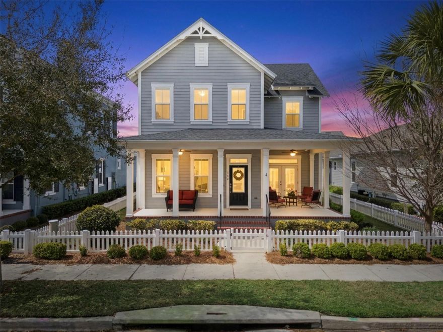 Perfectly positioned fronting one of Oakland Park’s picturesque green spaces, this exceptional home offers a rare opportunity to enjoy PARK-SIDE living in one of Winter Garden’s most celebrated communities. Oakland Park, a PARADE of HOMES award-winning neighborhood, is admired for its timeless architecture & inviting outdoor spaces that create a true sense of community. This beautifully designed Seaside floorplan blends classic charm with modern livability, offering 4 bedrooms, 3.5 baths, a STUDY, dining area, spacious loft, oversized garage, & FENCED yard. The primary suite is conveniently located on the main level, creating a peaceful retreat complete with a generous walk-in closet, a separate linen closet, & direct access to the laundry room, which has been enhanced with custom cabinetry for optimal storage & organization. Upstairs, the loft provides a versatile secondary living area—ideal for a media room or play space—accompanied by three additional bedrooms & two full baths, including one private en-suite. At the center of the home, the expansive kitchen is designed for both everyday living & effortless entertaining, enhanced with under cabinet lighting & tile backsplash. Abundant cabinetry & extensive counter space provide exceptional functionality, while the large island offers ample seating, making it the natural gathering place for family & guests alike. The adjoining dining area is equally impressive, featuring a dedicated buffet—perfect for hosting celebrations, holidays, or casual dinners. The home showcases rich WOOD flooring throughout the main living areas, adding warmth and sophistication, while soft carpeting in the bedrooms enhances comfort & tranquility. One of the home’s most captivating features is the inviting wraparound front porch, where French doors open to sweeping views of the beautifully maintained park. The home’s outdoor living continues in the screened rear porch, thoughtfully designed with retractable screens to maximize comfort & flexibility throughout the seasons. Beyond the porch, the backyard has been carefully curated as a private entertainment retreat. A paver patio anchors the space, complemented by a cozy FIRE-PIT, additional seating areas, & an outdoor kitchen featuring a built-in grill, mini fridge, & sink. Pet lovers will appreciate the dedicated dog area finished with low-maintenance artificial turf, creating a convenient & attractive space for four-legged family members. With its prime park-front location, versatile living spaces, & thoughtfully designed indoor-outdoor lifestyle, this home offers an exceptional blend of elegance, comfort, & community. Just a short GOLF CART ride away, you’ll find the charm and vibrancy of Historic Downtown Winter Garden, known for its award-winning restaurants, boutique shopping, outdoor dining, farmers market, & events. This is more than a home — it’s a lifestyle defined by luxury, walkability, connection, & the unmatched charm of Winter Garden living. This golf-cart-approved WATERFRONT community offers year-round activities, from golf cart parades to book clubs & social gatherings, making it an extraordinary place to call home. The community features parks, playgrounds, two pools, a clubhouse, dog park, & trails, including access to the 22 mile long WEST ORANGE TRAIL. Don’t miss this opportunity to live in one of the areas most sought-after neighborhoods, with easy access to interstate travel, shops, restaurants, golf courses, & world-renowned theme parks!