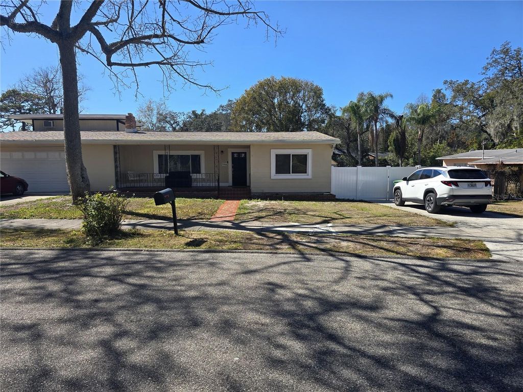 Photo of 9306 Forest Hills Drive, Tampa, FL 33612 (MLS # TB8474565)