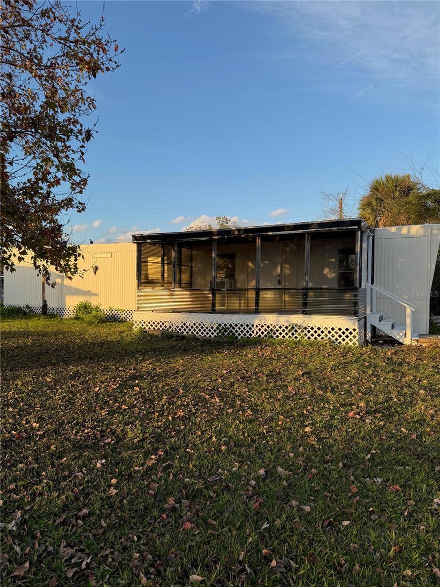 Looking for a mobile home on land you own? Here’s your opportunity.
This 2-bedroom, 1-bath home sits on a generous, fully fenced lot and just needs a few finishing touches to be move-in ready or rent-ready. Enjoy the river breeze with a nearby boat ramp, Goodriches Seafood restaurant and world class inshore fishing in Mosquito Lagoon. Along with the convenience of being just 8 miles from New Smyrna Beach with downtown restaurants, Beach access and shopping. No HOA. No restrictions. A flexible property with great potential—this one is ready to go!