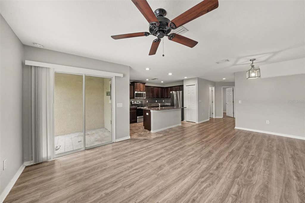 Photo of 5042 Chipotle Lane, Wesley Chapel, FL 33544 (MLS # O6422868)